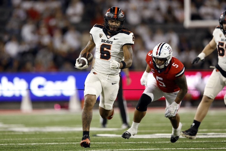 Damien Martinez (l.), has rushed for over 1,000 yards and seven touchdowns to become Oregon State's top offensive player.