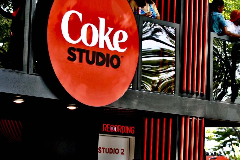 Coca-Cola has an AI-powered studio on the Gov Ball grounds, where festivalgoers can create a band and make a music video for a song that's created with the help of artificial intelligence.