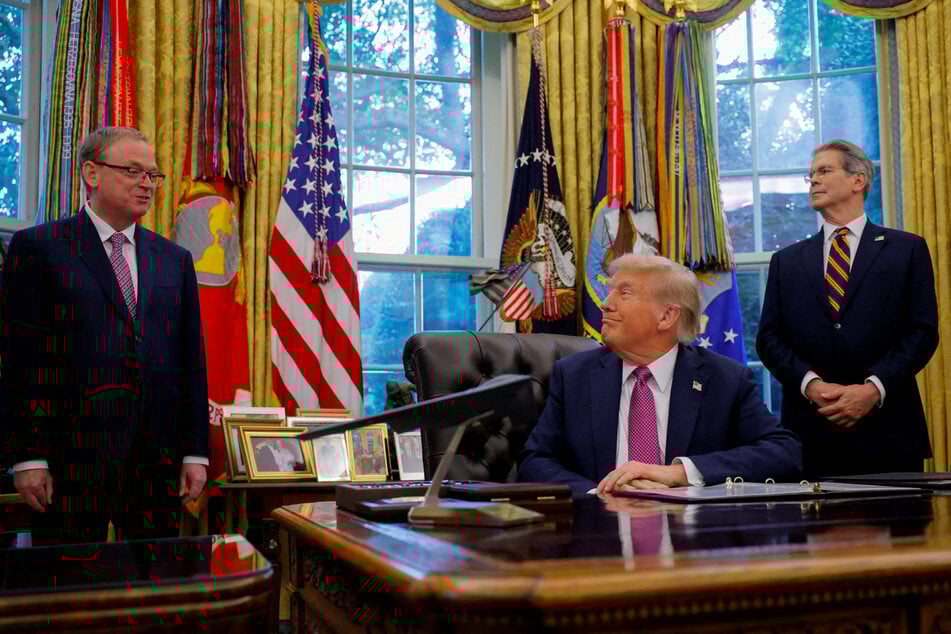 President Donald Trump (c.) and Treasury Secretary Scott Bessent (r.) listen as National Economic Council Director Kevin Hassett speaks in the Oval Office of the White House on September 5, 2025.