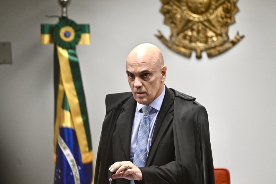 Brazilian Supreme Court Judge Alexandre de Moraes speaks during hearings involving former President Jair Bolsonaro and his associates accused of attempting a coup d'état in January 2023, in Brasília on June 9, 2025.