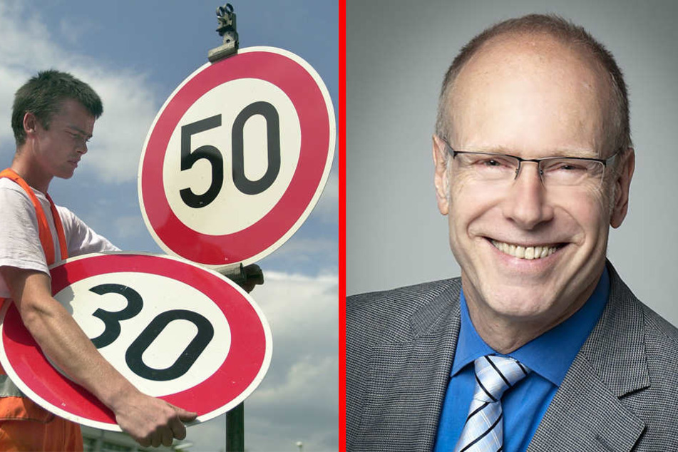 Ein Mitarbeiter der Straßenmeisterei wechselt ein 50-Stundenkilometer-Schild gegen ein Schild mit Tempo-Limit 30. Kellner unterstützt dies.