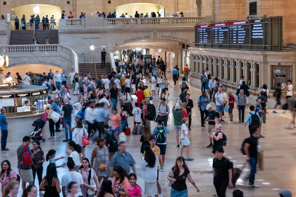 Two people were injured in what police say was an unprovoked slashing attack at New York City's Grand Central subway station on Christmas Eve.