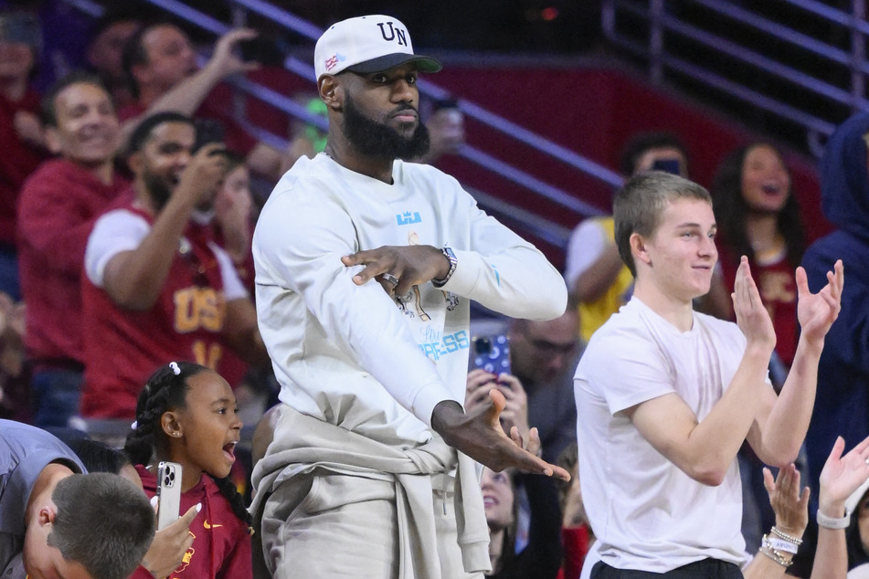LeBron James was courtside to cheer on his son on a debut months in the making.