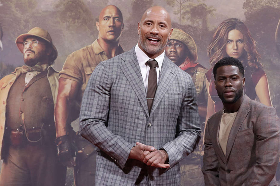 Dwayne Johnson (l) und Kevin Hart bei der Deutschland-Premiere des Films "Jumanji".