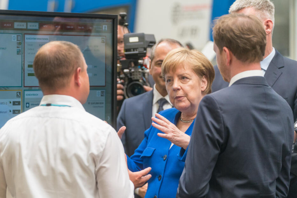 Bundeskanzlerin Angela Merkel besucht gemeinsam mit dem Ministerpräsidentvon von Sachsen, Michael Kretschmer und Siemens-Vorstand Joe Kaeser das Siemens-Werk in Görlitz.