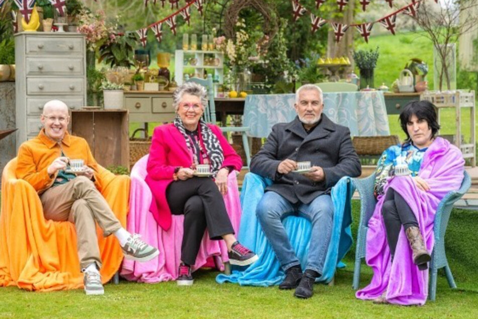 From l. to r.: Matt Lukas, Prue Leith, Paul Hollywood, and Noel Fielding are the beloved judges and hosts of The Great British Baking Show.