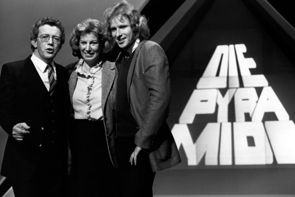 Klassiker der Game-Shows: Moderator Dieter Thomas Heck (l.) präsentierte die ZDF-Show "Die Pyramide". 1981 waren Mildred Scheel (M.) und Thomas Gottschalk (r.) zu Gast.