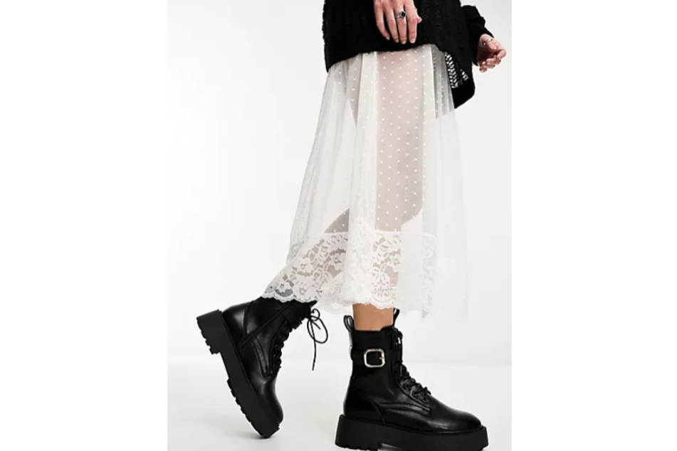 Lace-up boots and buckles make for an eye-catching combination.