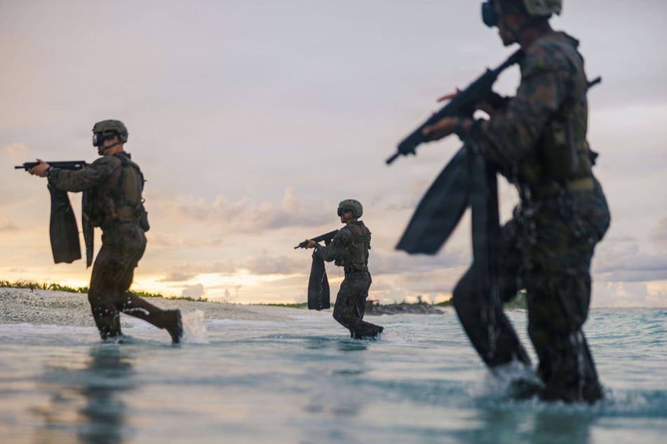 US Marines with Force Reconnaissance Platoon, 31st Marine Expeditionary Unit, conduct a reconnaissance and surveillance rehearsal mission, part of a simulated amphibious assault exercise, in Diego Garcia, Chagos Islands, on March 24, 2026.