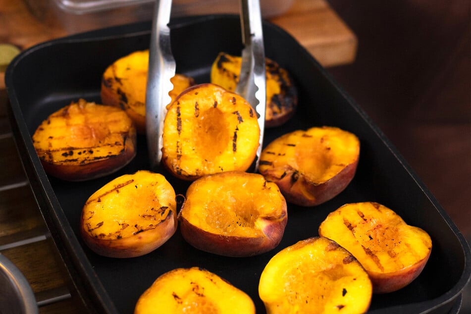 Peaches are perfect for grilling! You can slather them in butter, sprinkle them with sugar, and serve them with ice cream for dessert.