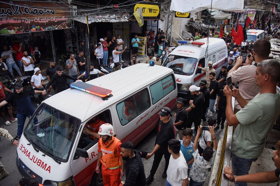 The bodies of Palestinians killed in Israeli strikes on Lebanon are driven to their burials on Monday.