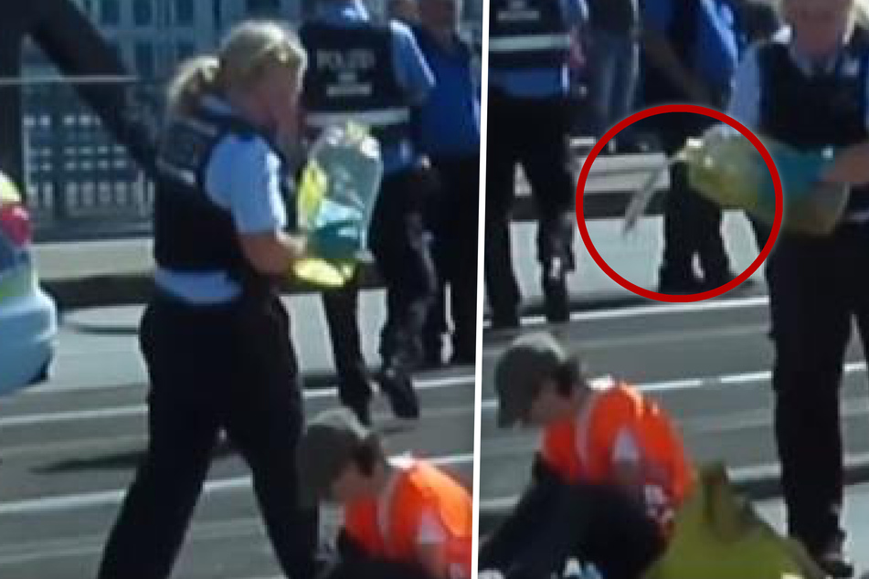 Um diese Situation geht es: Eine Polizistin hält den Ölkanister direkt über eine auf dem Boden sitzende Aktivistin und schüttet etwas von der Flüssigkeit direkt über deren Körper.