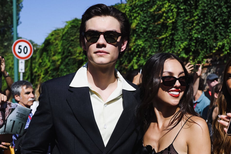 Louis Partridge (l.) and Olivia Rodrigo first sparked dating rumors in late 2023.