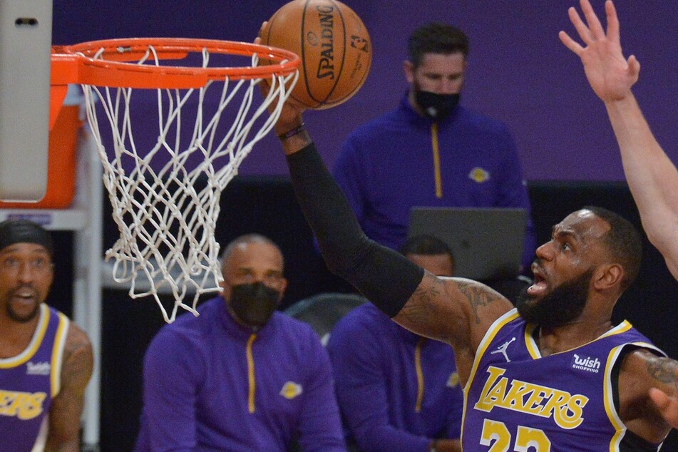 NBA: Lakers squeeze past Warriors in play-in clash dominated by LeBron-Curry matchup