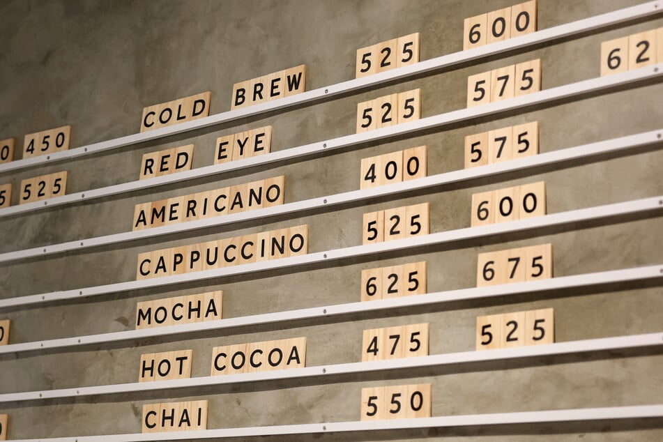 Customers are facing price hikes as tariffs and transport costs increase costs for coffee businesses.