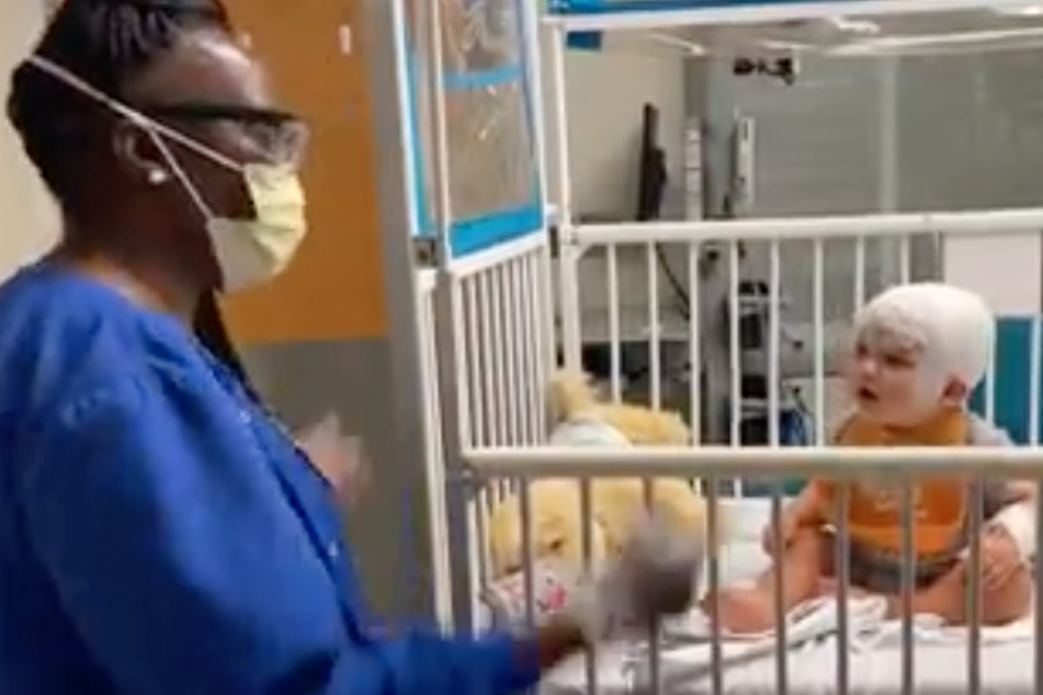 Quanda Riles dances with Blake at the hospital.