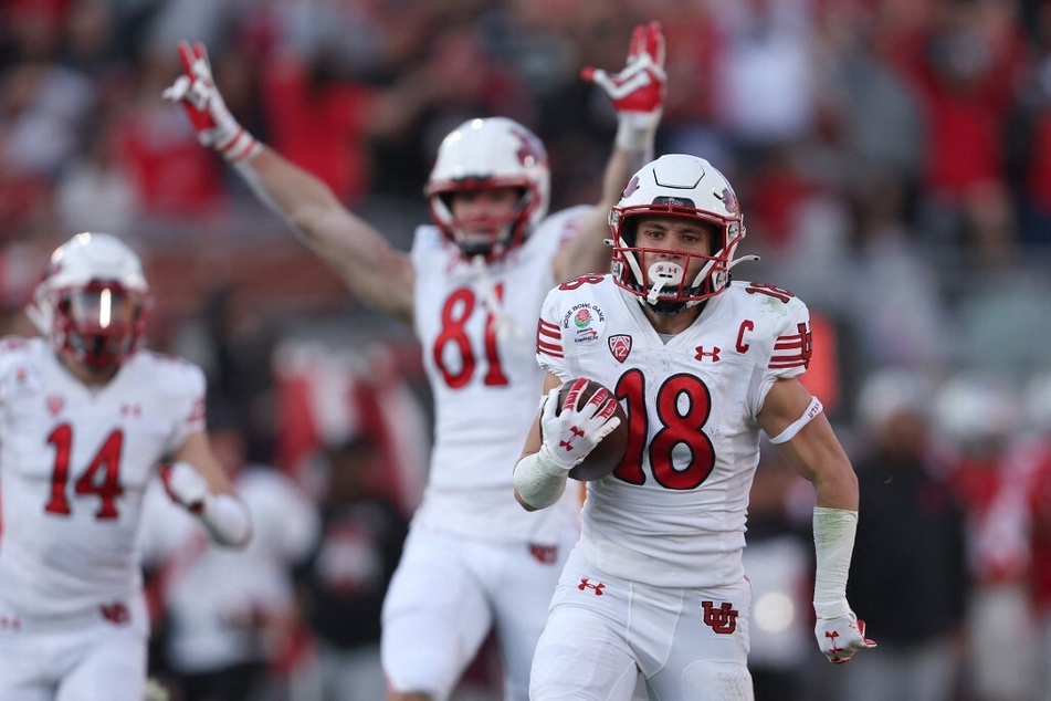 Britain Covey of the Utah Utes rushes for a touchdown against the Ohio State Buckeyes during the second quarter in the Rose Bowl Game.