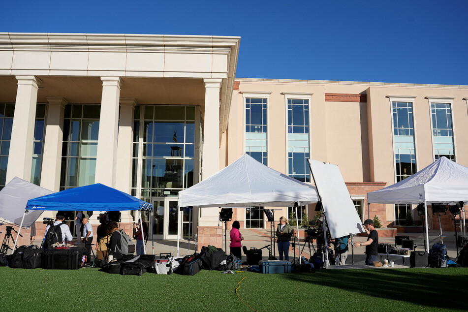 Media flocked to the scene of Alec Baldwin's manslaughter trial in Santa Fe on Tuesday.