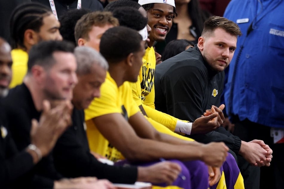 Luka Doncic of the Los Angeles Lakers sits on the bench during the first half against the LA Clippers on February 4, 2025, in Inglewood, California.