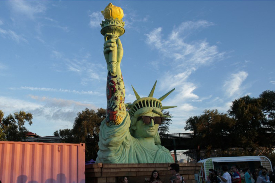 Lady Liberty will soon wield her tatted sleeve and torch over Gov Ball once again!