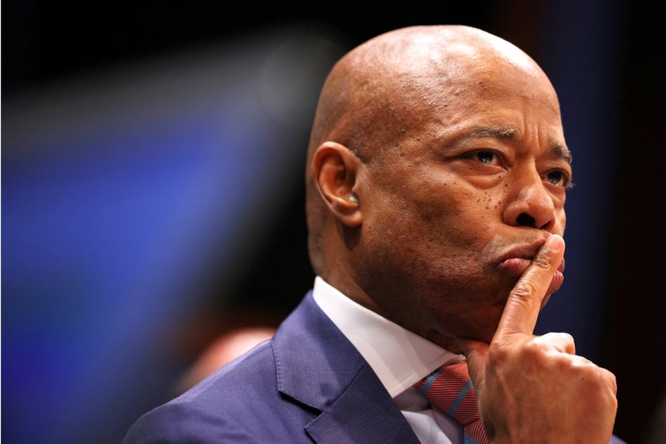 An advisor to Eric Adams' re-election campaign has been suspended after she reportedly gave a journalist a bag of money at a recent event.