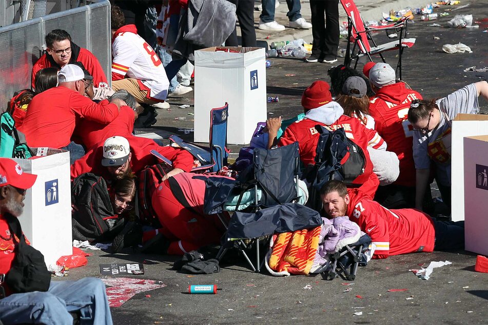 Fans took cover during the shooting at Union Station during the Kansas City Chiefs Super Bowl LVIII victory parade on Wednesday.
