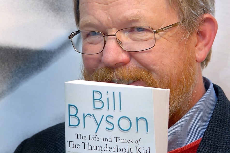 Bill Bryson poses as he celebrates the paperback publication of his autobiography The Life and Times of the Thunderbolt Kid in London.