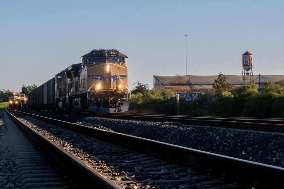 Freight trains travel through Houston, Texas, on September 14, 2022 – the day before the tentative agreement was announced.