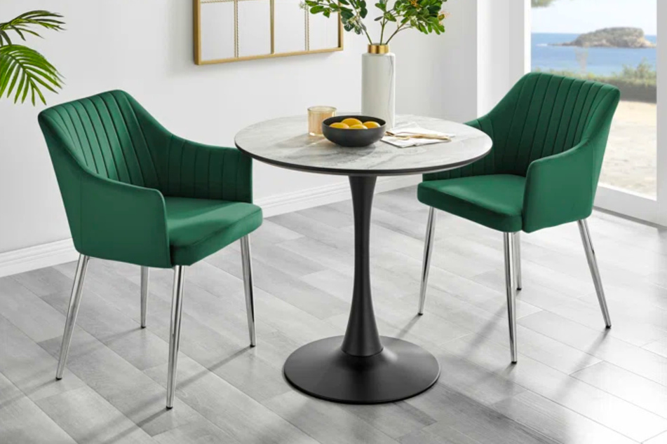 Wayfair is selling this white marble dining table for less than half the price!