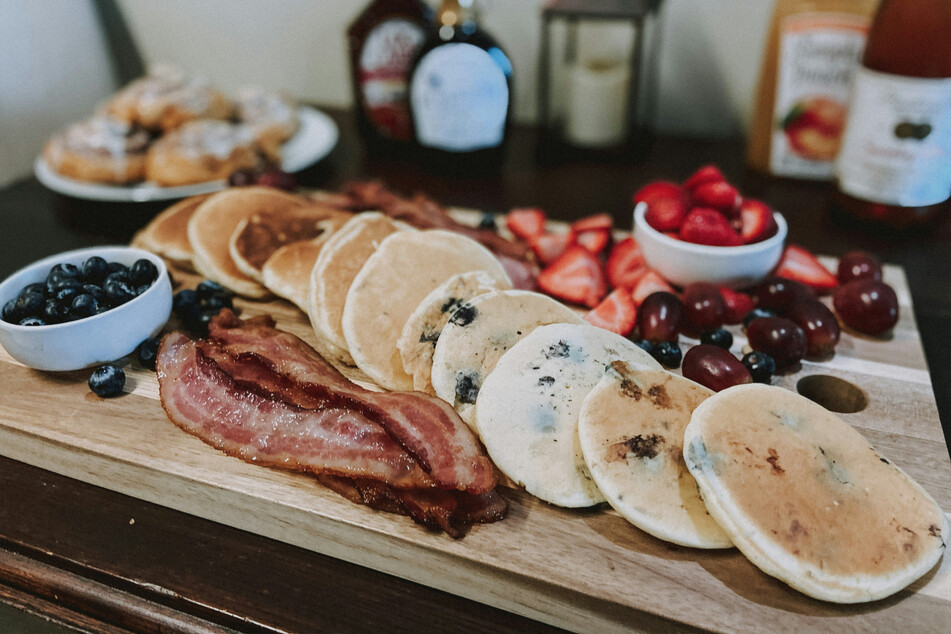 The best way to eat pancakes is with bacon and a little bit of maple syrup.