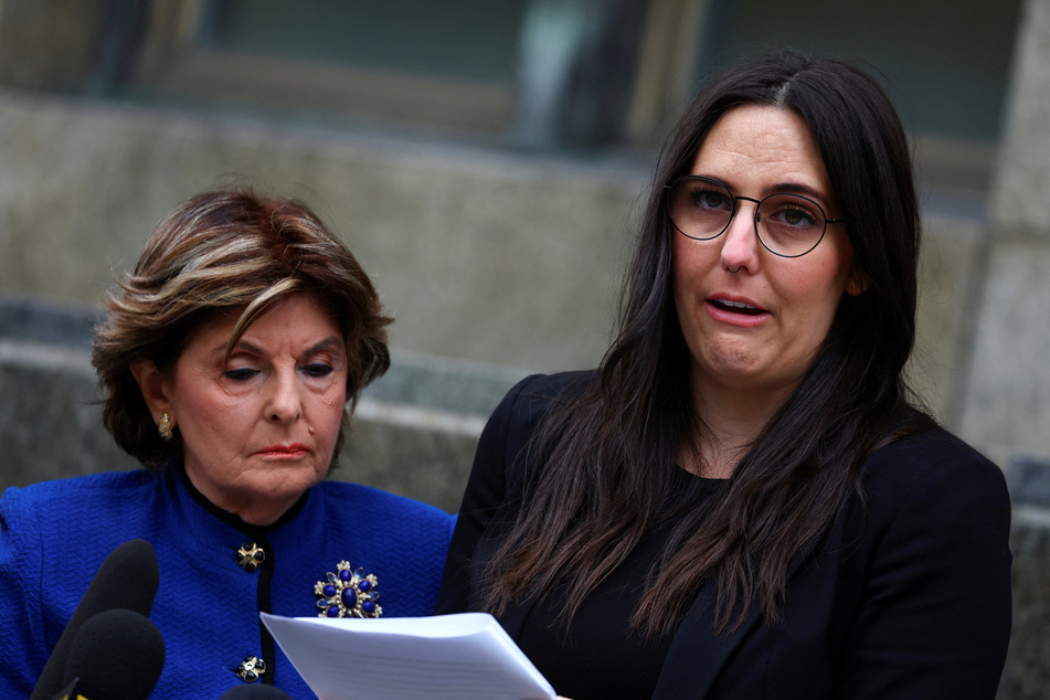 Attorney Gloria Allred (l.) stood by Kelsey Harbert, an accuser of Cuba Gooding Jr., as she spoke outside New York Criminal Court following the actor's sentencing hearing on Thursday.