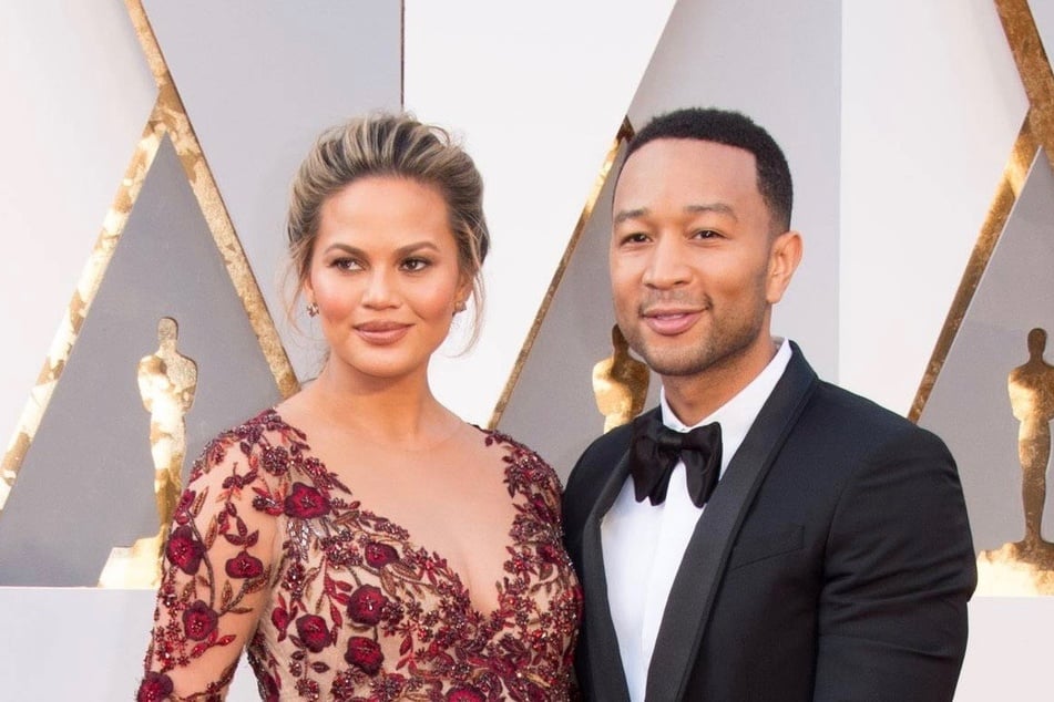 Chrissy Teigen (34) and John Legend (41).