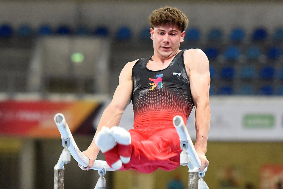Dario Sissakis gewinnt Gold am Barren.