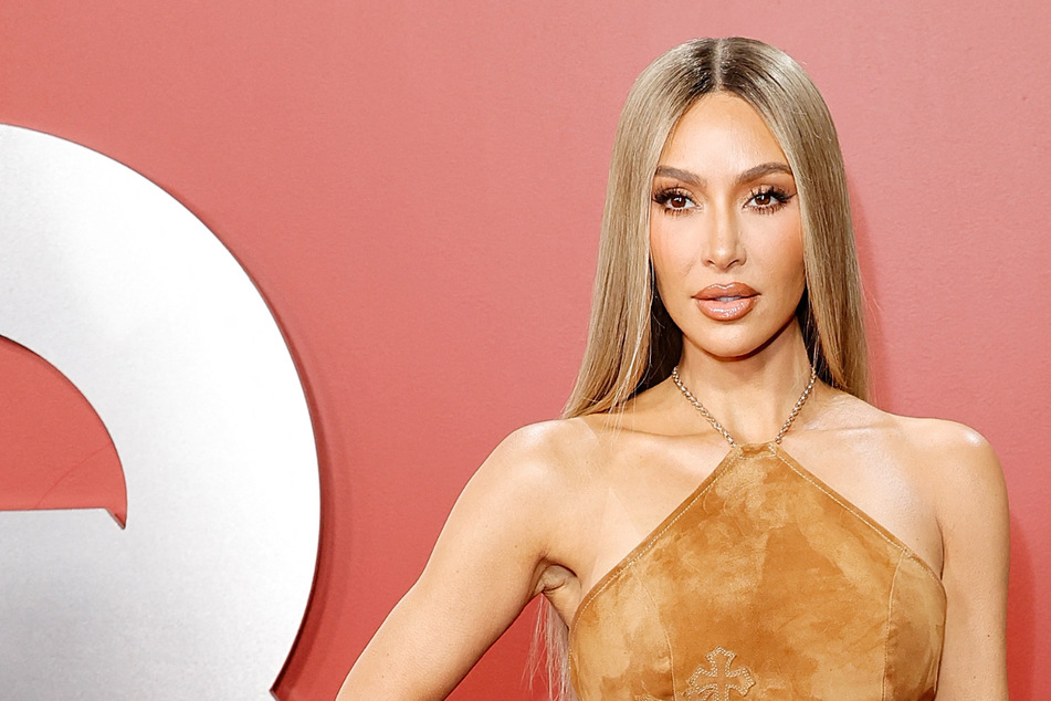 Kim Kardashian flaunts handbag collection in "out of touch" Balenciaga campaign