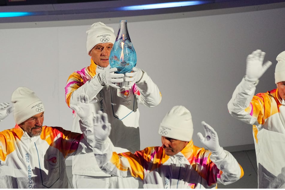 Vier Herren sind dafür verantwortlich, dass das Olympische Feuer nach Verona getragen wird.