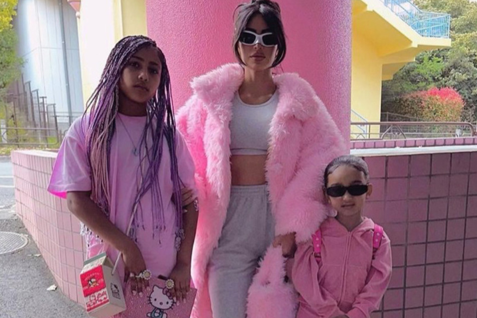 Kim Kardashian spent 2023 creating memories with her four kids, including North and Chicago West (r.).