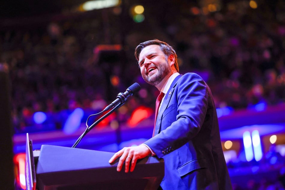 JD Vance (pictured) has defended comedian Tony Hinchcliff, who has been receiving backlash for telling racist jokes during a Donald Trump rally.