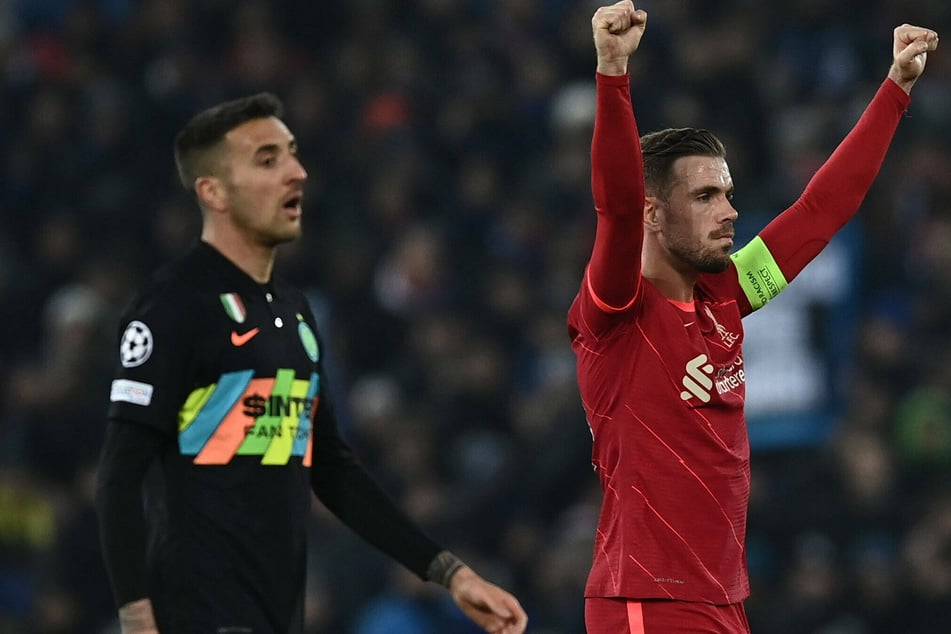 Liverpool captain Jordan Henderson celebrates winning 2-1 on aggregate against Inter Milan.