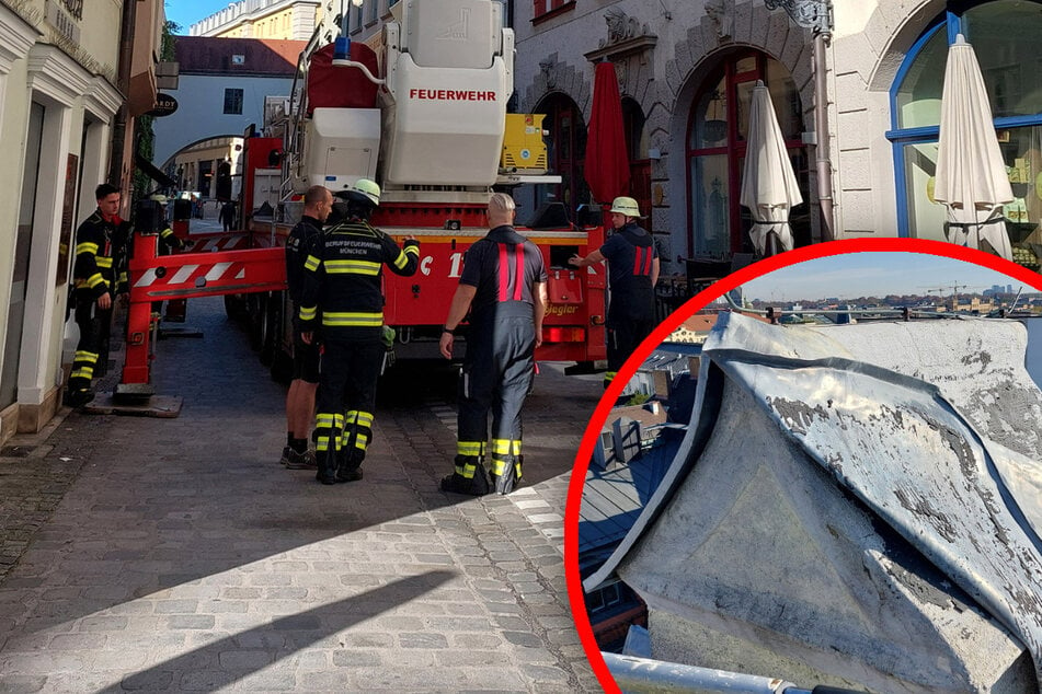 München: Blechdach droht abzustürzen! Feuerwehr sperrt Straße in München