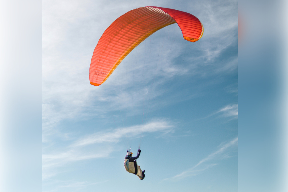 A skydiver crash-landed after his parachute only partially opened, hitting a residential house (stock image).