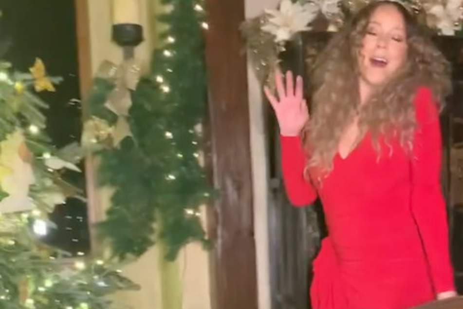 Carey singing All I Want for Christmas Is You in an Instagram video.