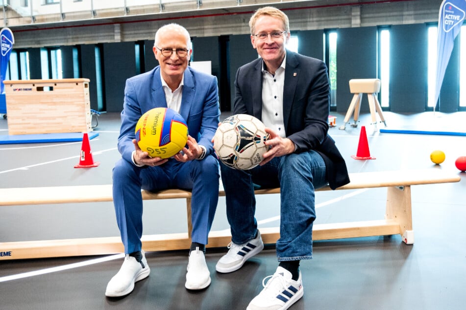 Hamburgs Bürgermeister Peter Tschentscher (59, SPD, l.) und Schleswig-Holsteins Ministerpräsident Daniel Günther (51, CDU) wollen Olympia in den Norden holen.