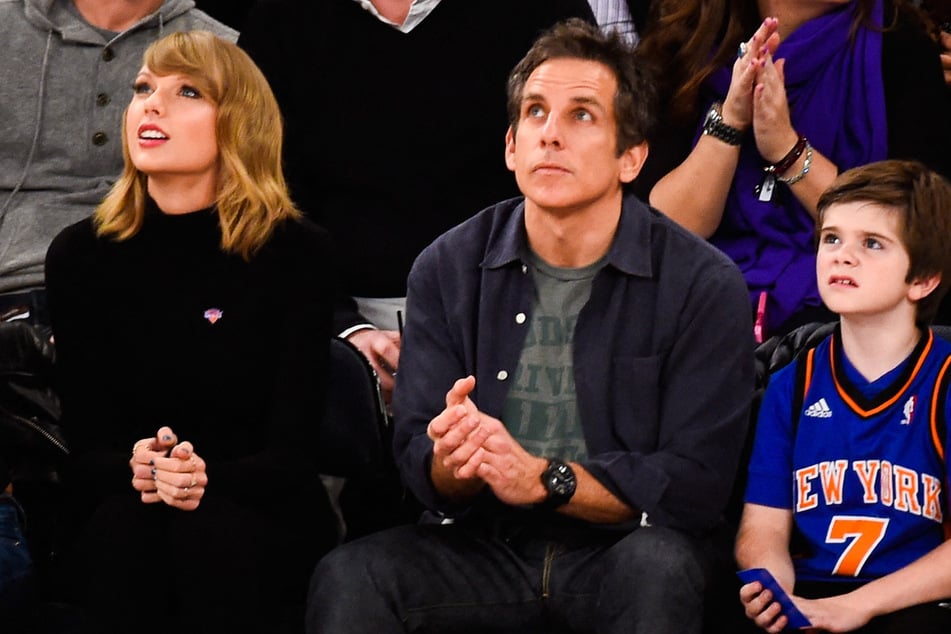 Taylor Swift (l.) sat courtside next to Ben Stiller and his son (r.) at a 2014 New York Knicks game.