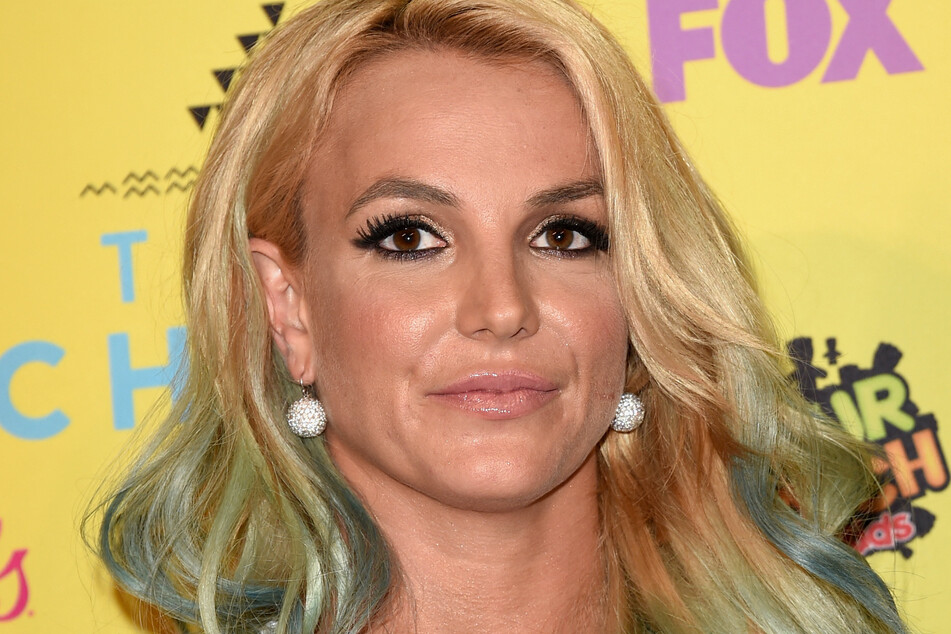 Britney Spears may have reunited her ex Paul Soliz after publicly slamming the felon on Instagram.