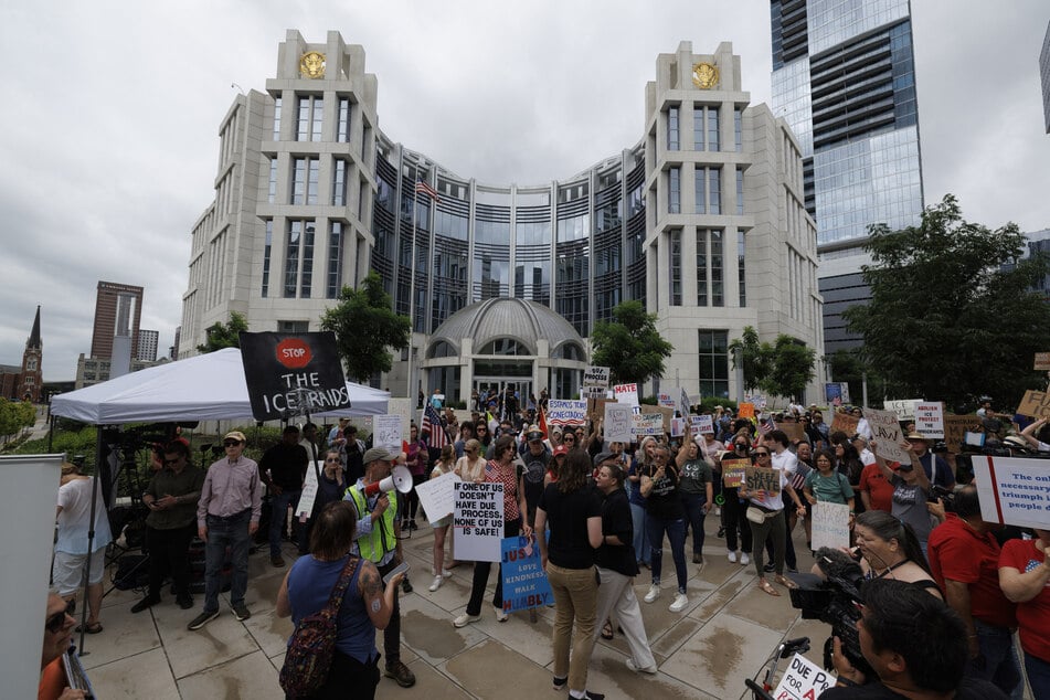 Protesters gather during the arraignment of Kilmar Abrego Garcia at Fred D Thompson Federal Building & Courthouse on Friday in Nashville, Tennessee.