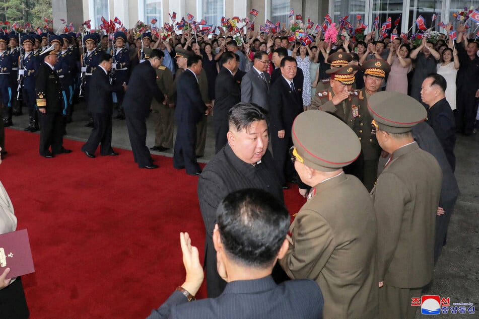 Kim Jong-un is seen off by North Korean officials as he departs for Vladivostok in Russia.
