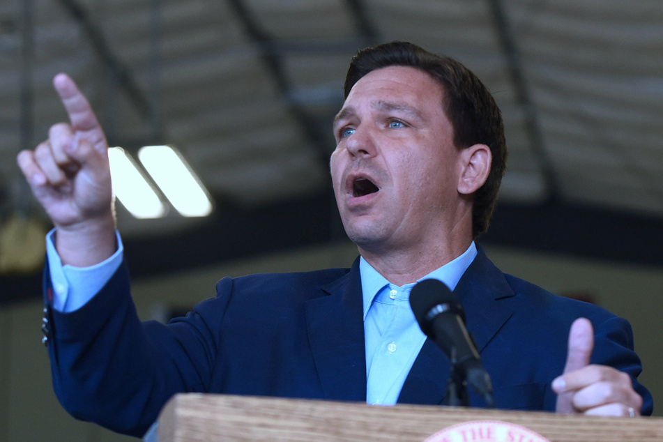 Florida Governor Ron DeSantis disagrees with the use of vaccine passports and says they violate personal freedoms.