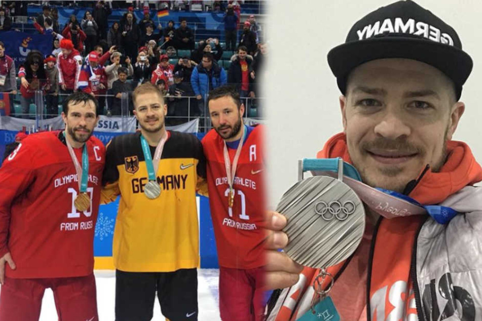 Moritz Müller zeigt seine Silbermedaille (r.)