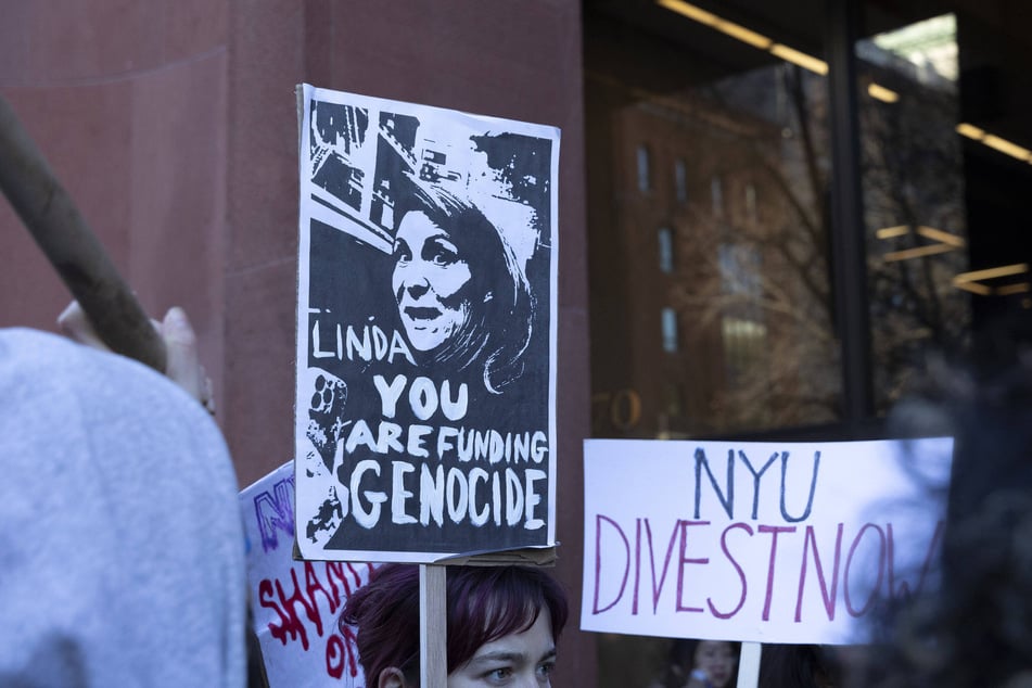 NYU students, faculty, and staff demonstrate for Palestinian liberation and divestment from Israel outside the Elmer Holmes Bobst Library on December 12, 2024.