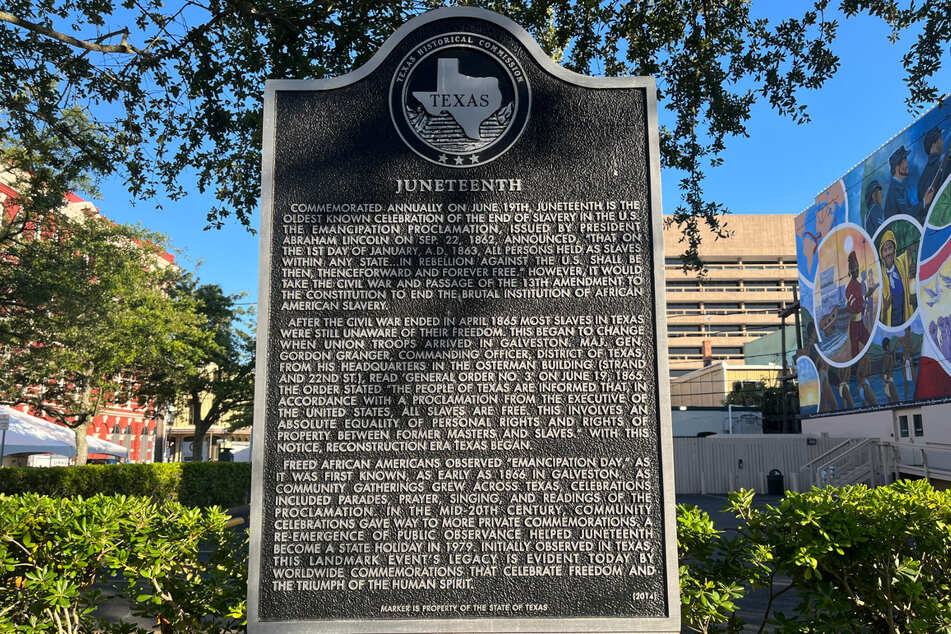 A Juneteenth marker on The Strand in Galveston, Texas, explains the history of the holiday.